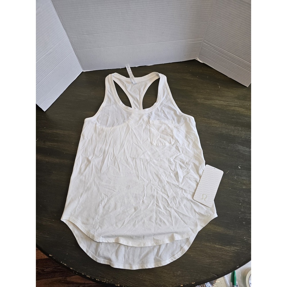 Luluemon Yogi Racer Back 3 Size 8 With Pocket Cream Colored Top C425